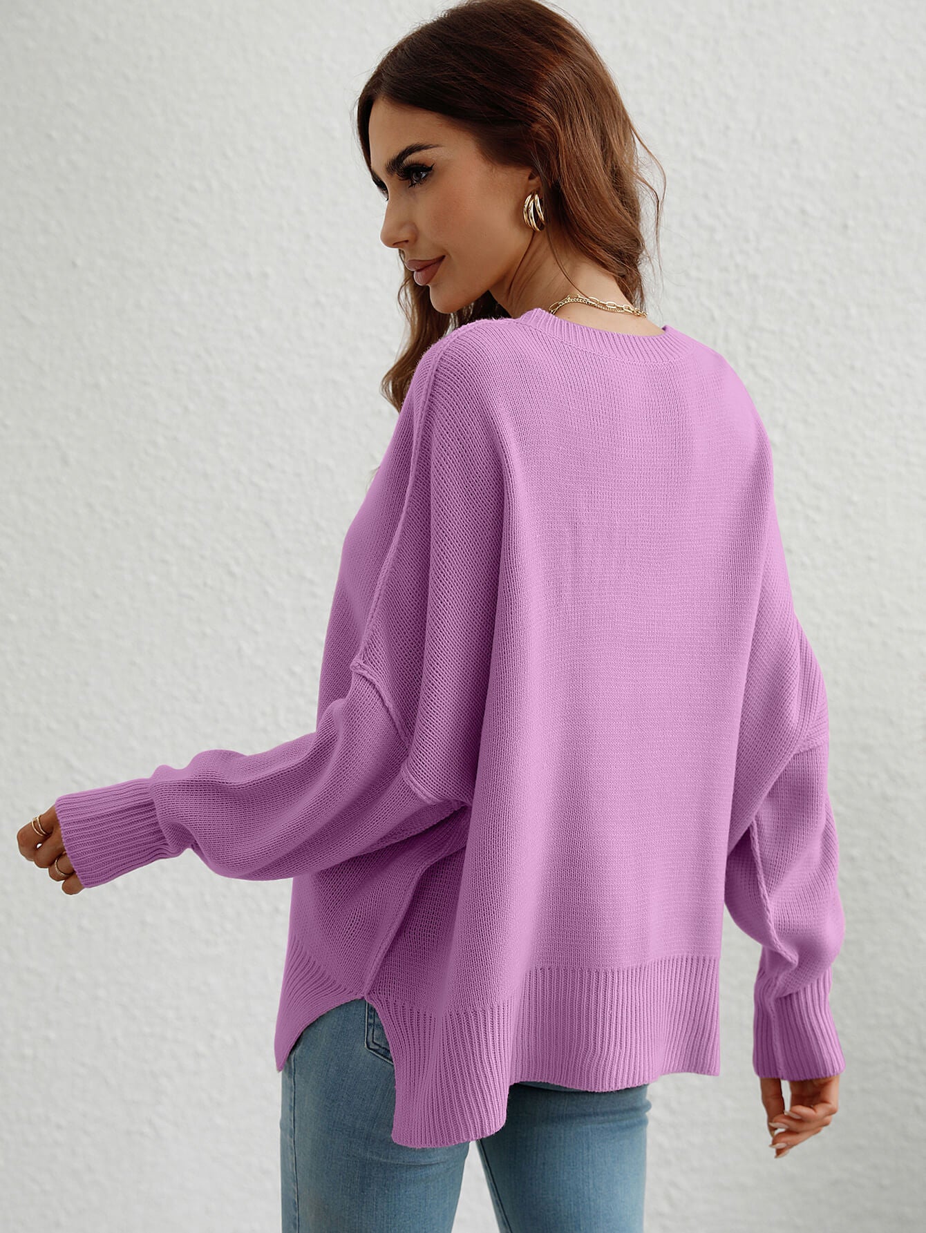 exposed seam dropped shoulder slit sweater