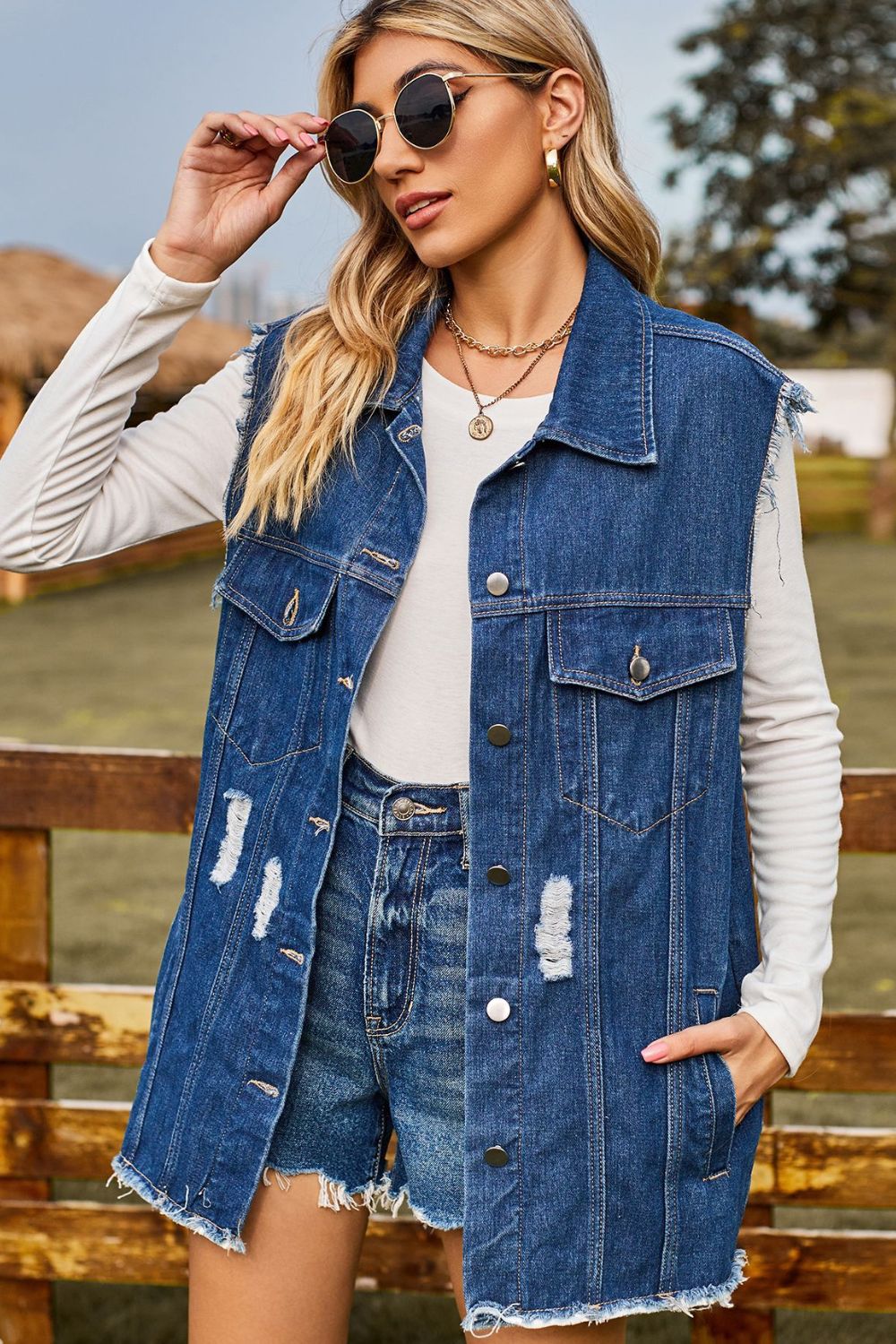 sleeveless button-up collared denim top with pockets