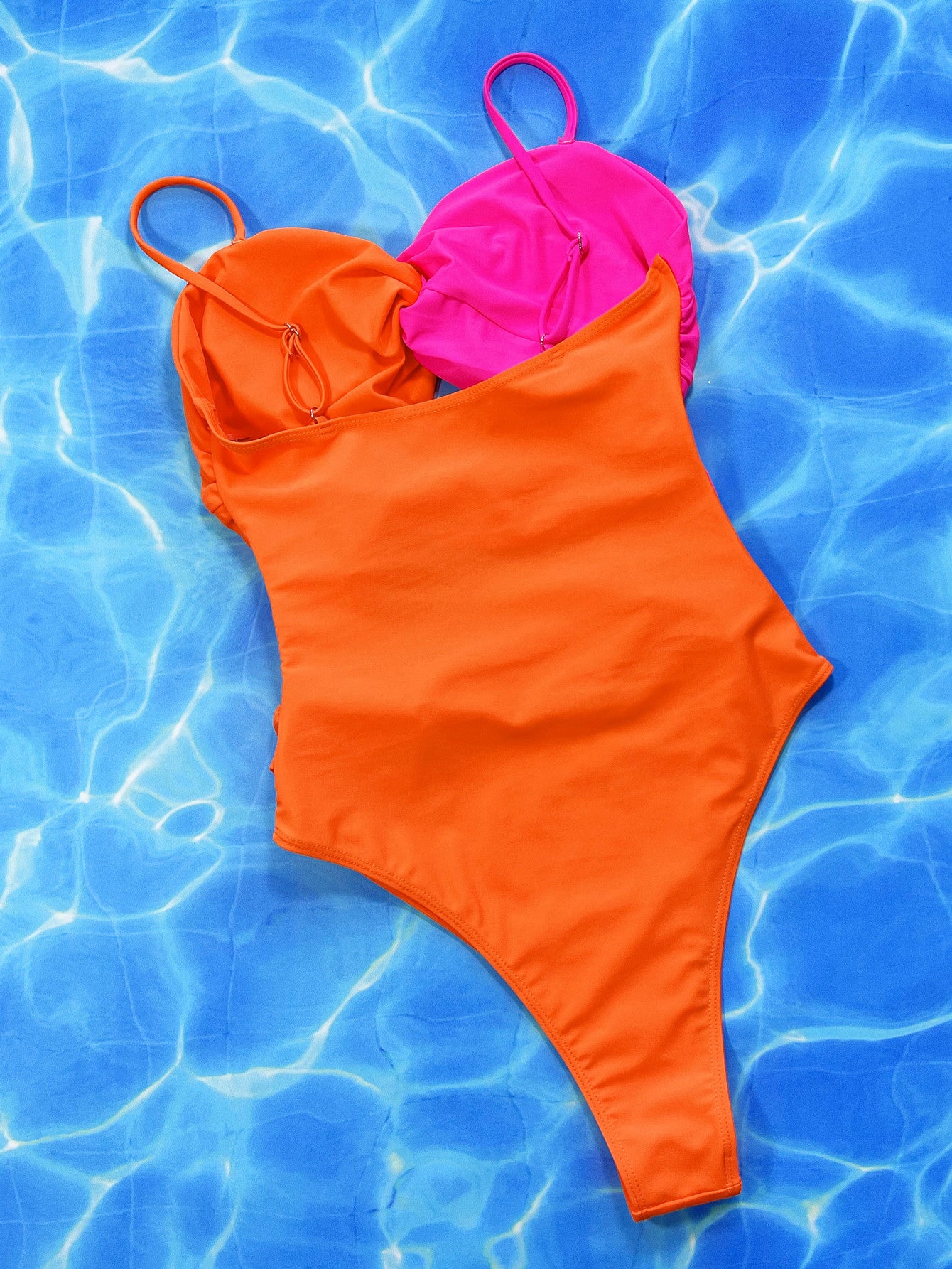 two-tone twisted cutout one-piece swimsuit