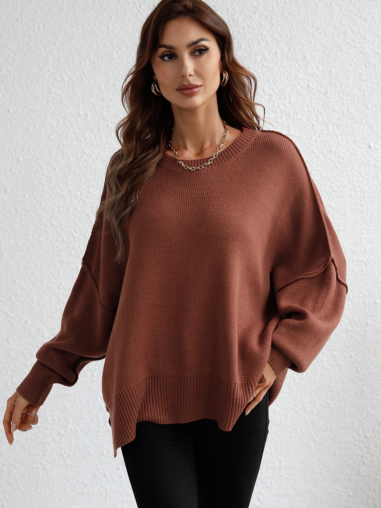 exposed seam dropped shoulder slit sweater