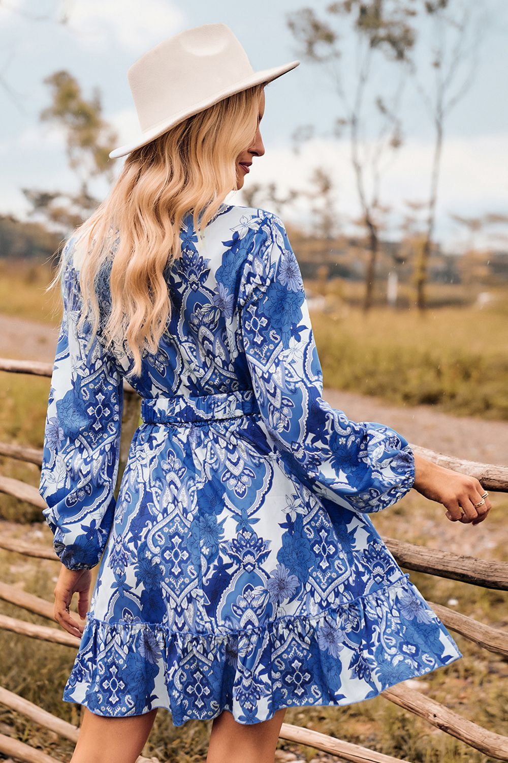 printed surplice neck long sleeve dress