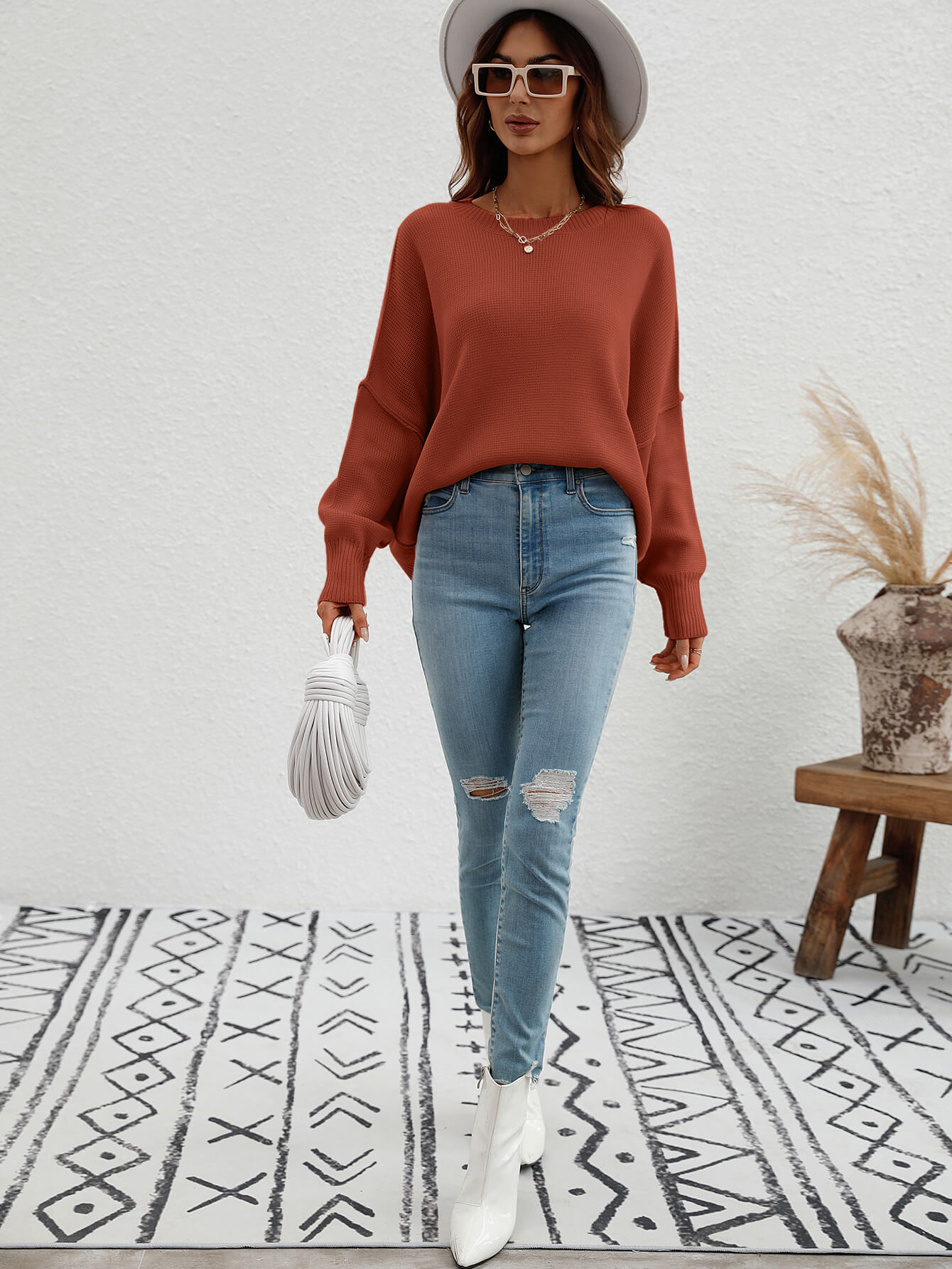 exposed seam dropped shoulder slit sweater