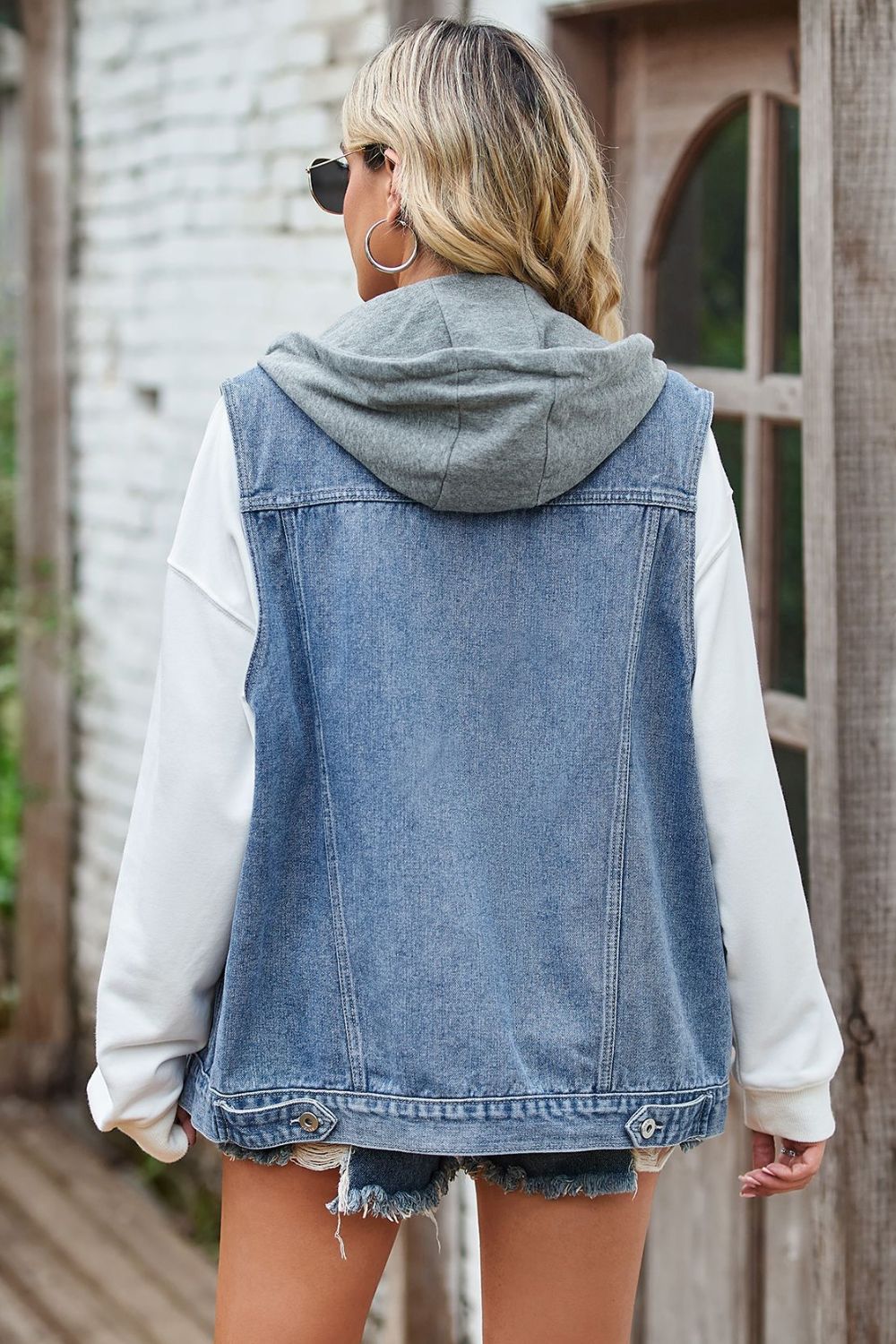 sleeveless denim top with a detachable hood