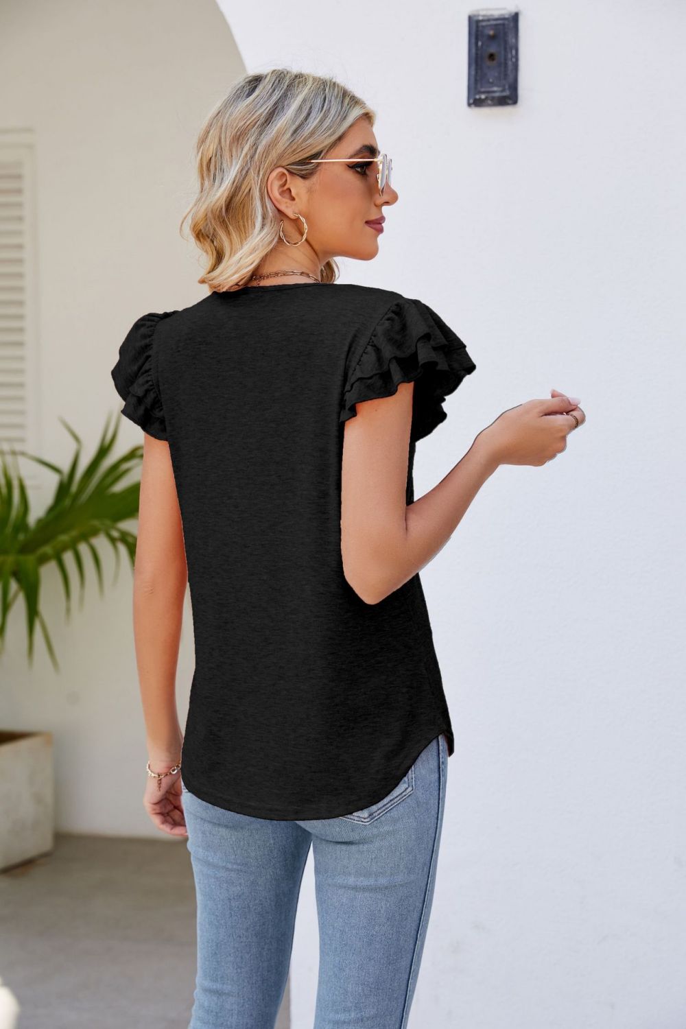 smocked flutter sleeve v-neck top