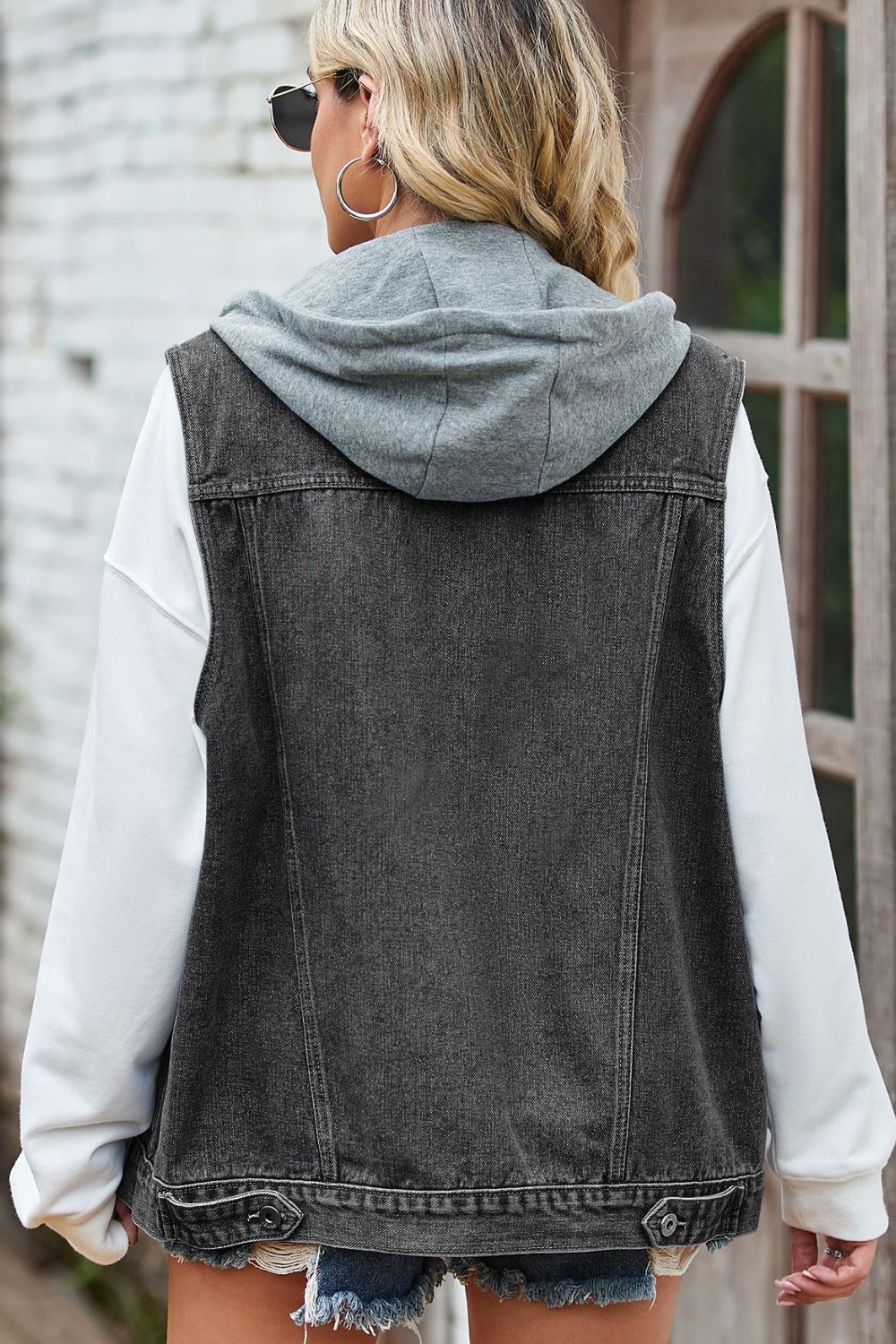 sleeveless denim top with a detachable hood