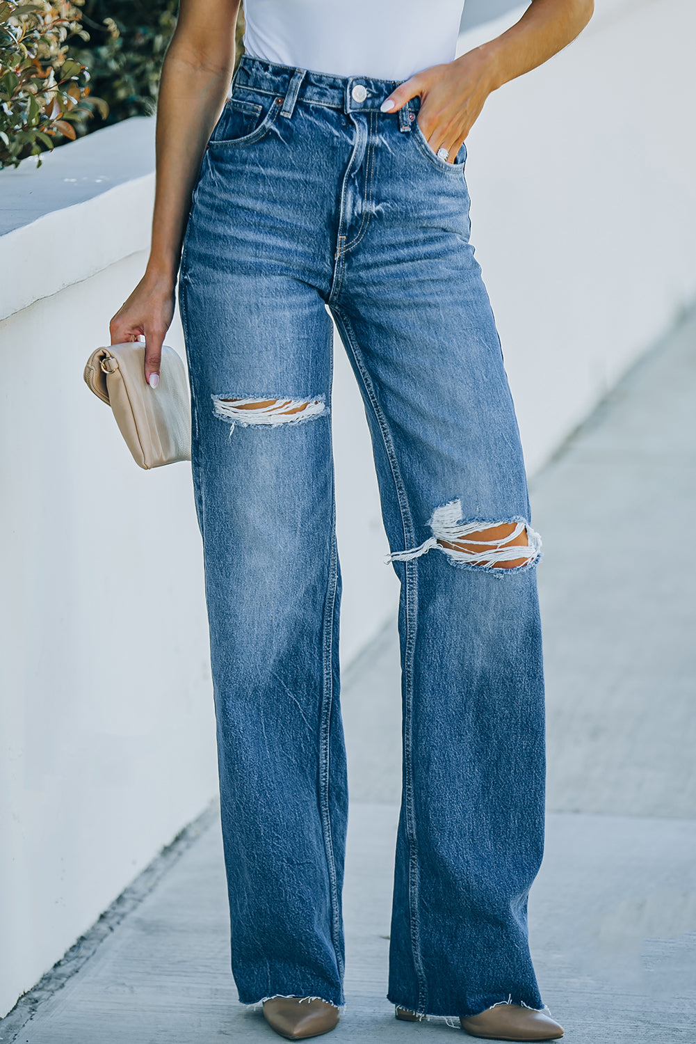 high-rise distressed raw hem jeans