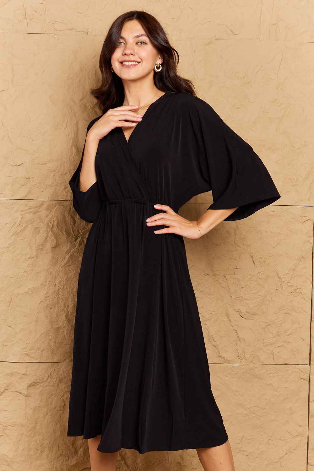 onetheland make your move solid surplice midi dress