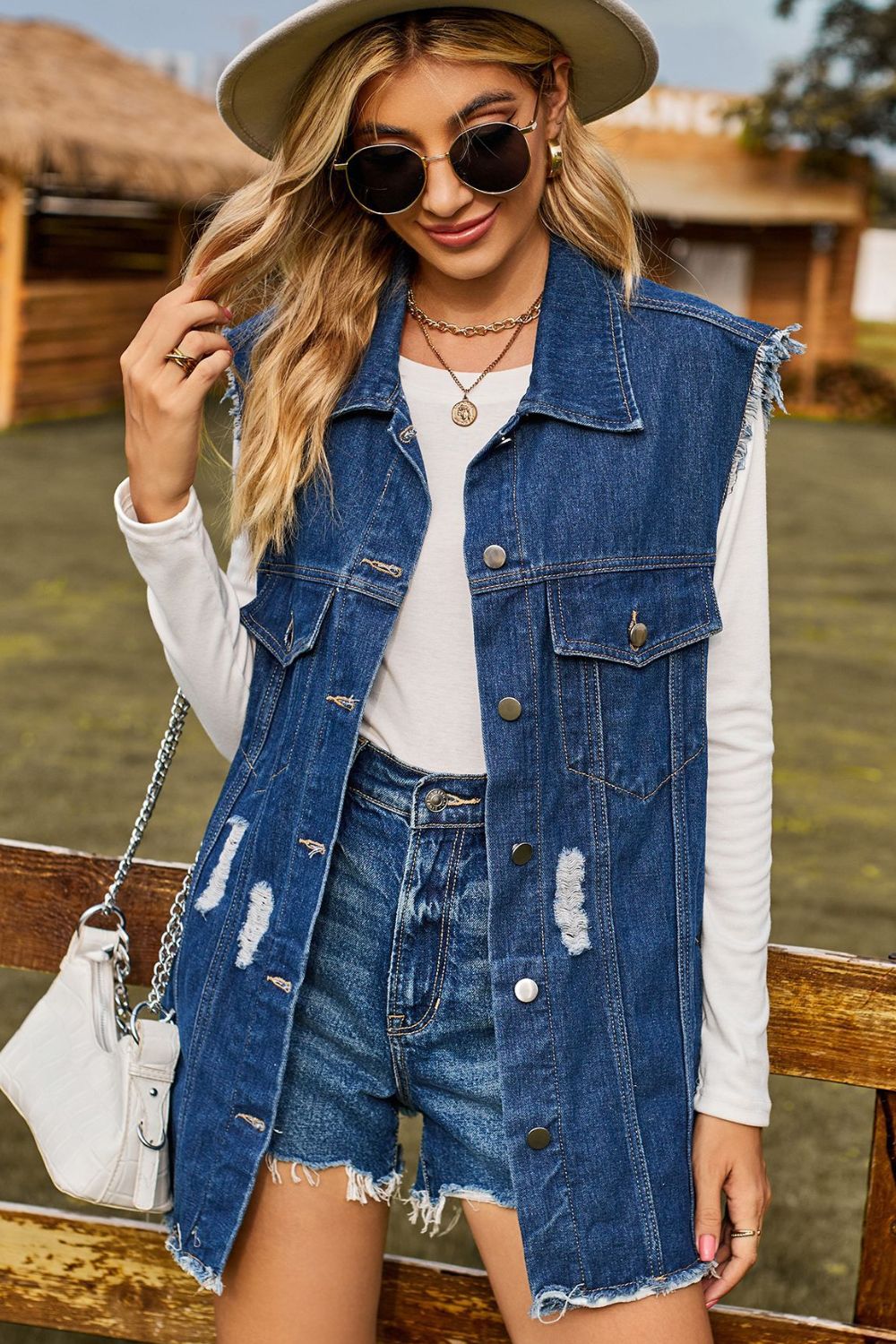 sleeveless button-up collared denim top with pockets