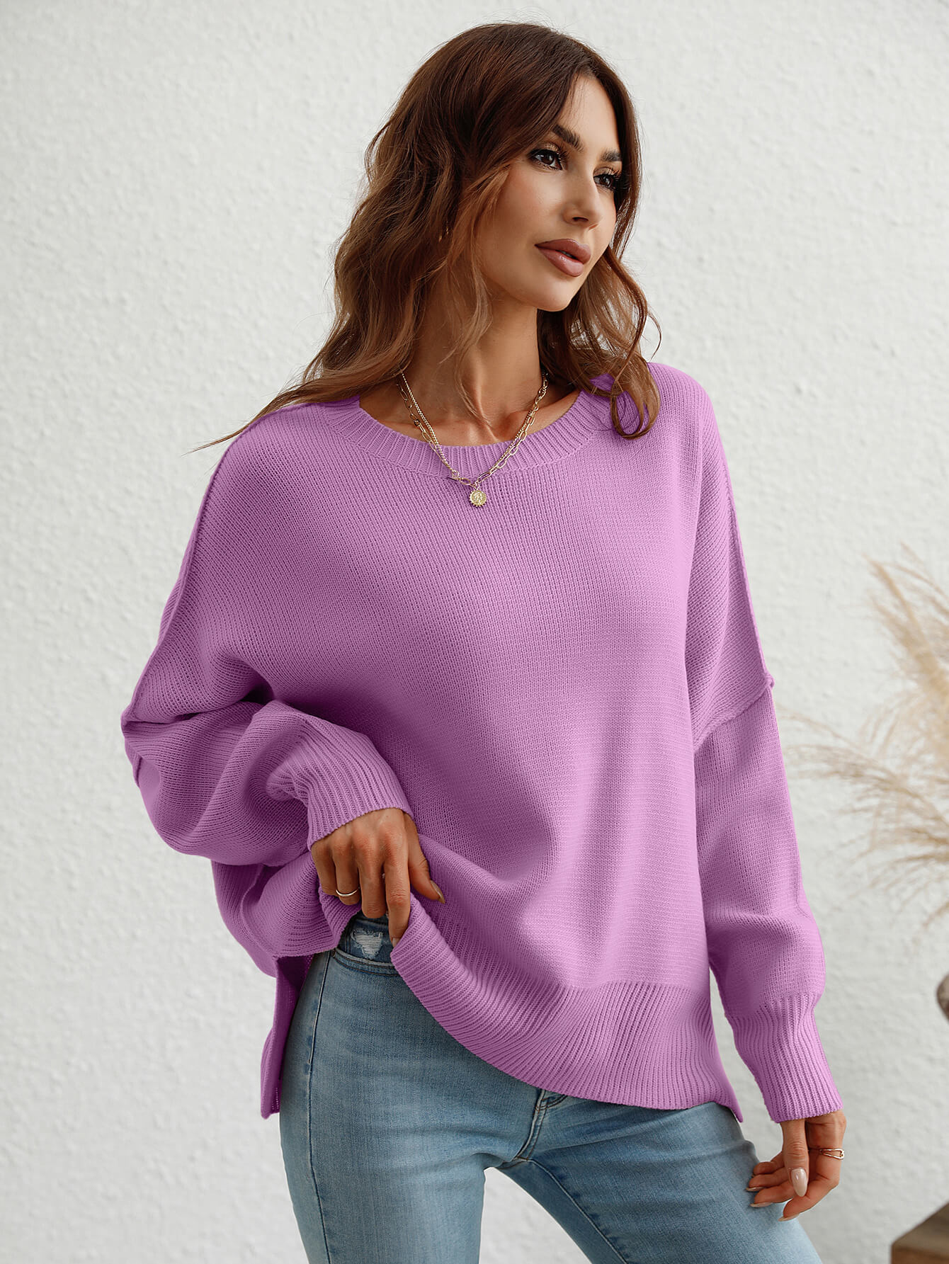 exposed seam dropped shoulder slit sweater