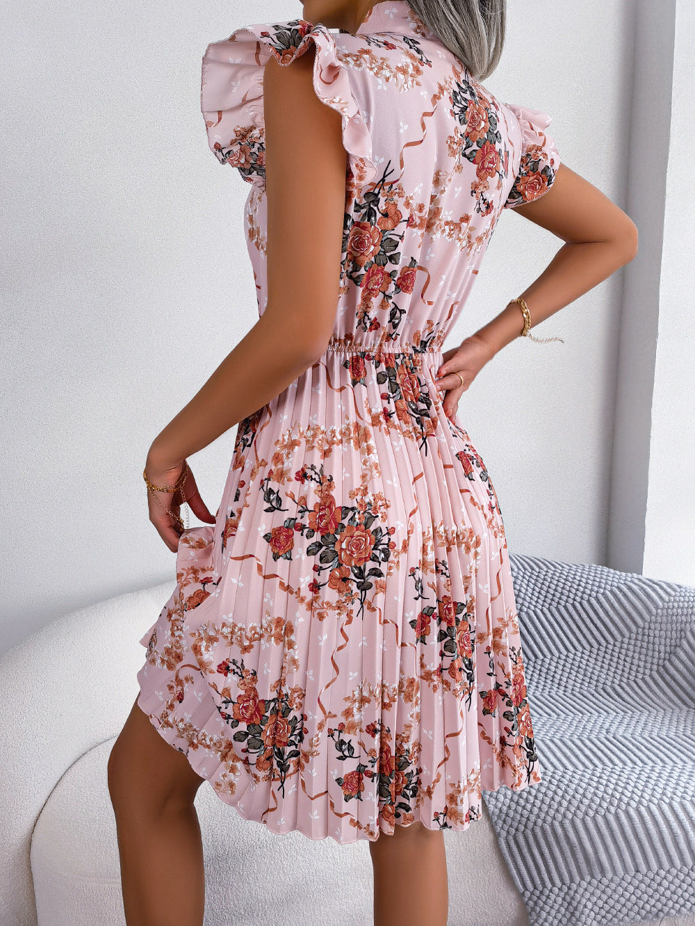 pleated floral printed tie neck knee length dress