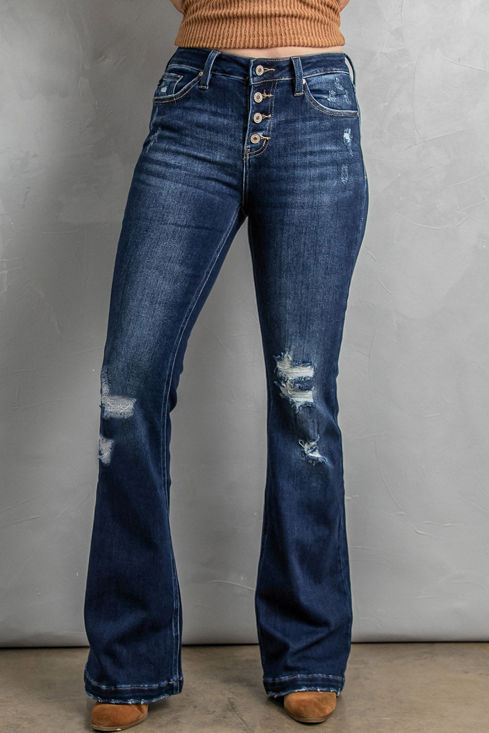 button fly distressed bootcut jeans