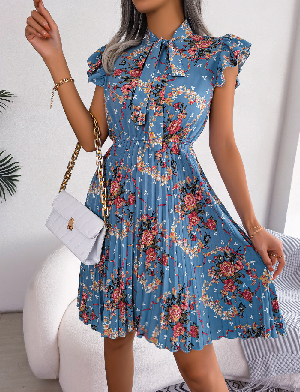 pleated floral printed tie neck knee length dress