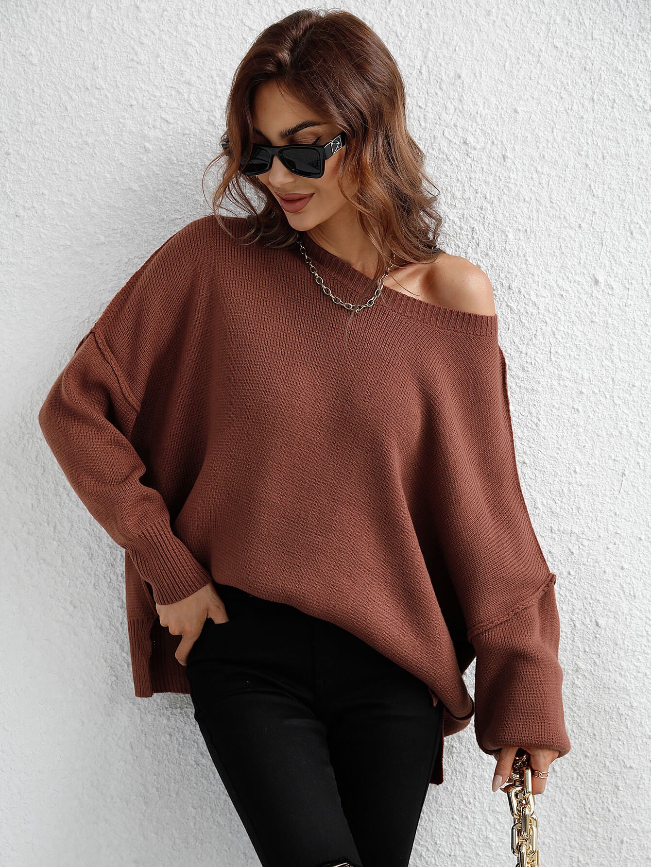 exposed seam dropped shoulder slit sweater