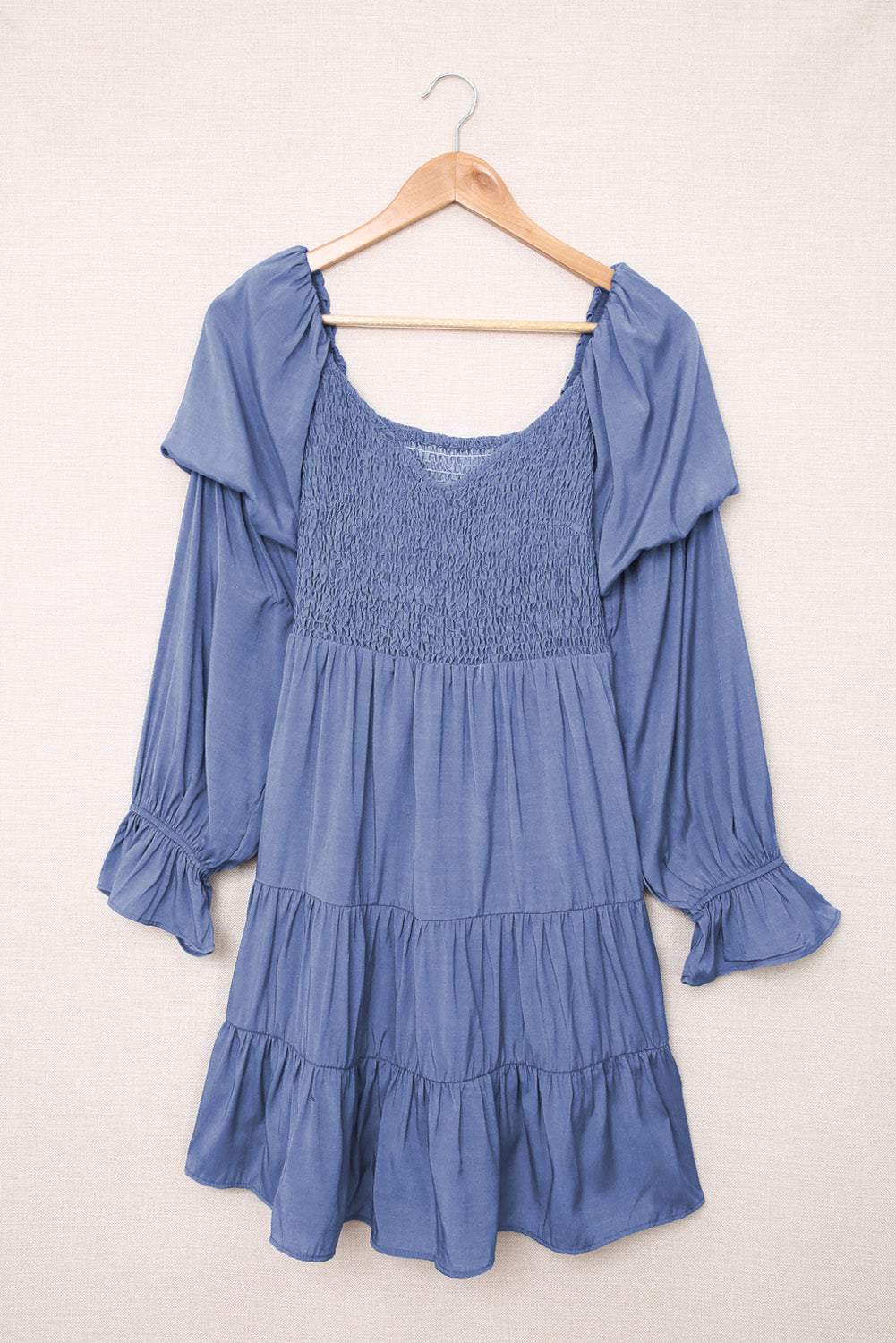 smocked off-shoulder tiered mini dress