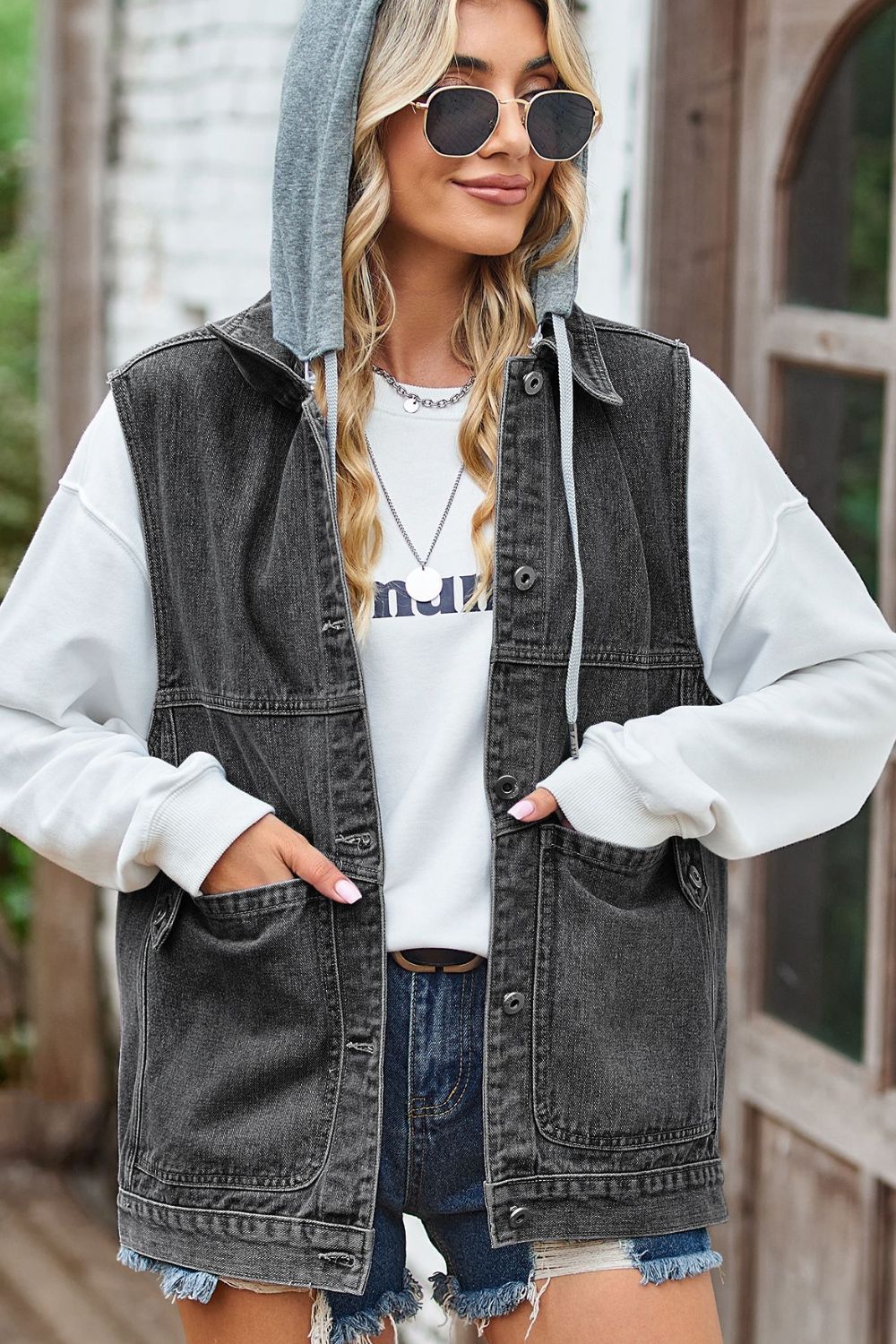 sleeveless denim top with a detachable hood