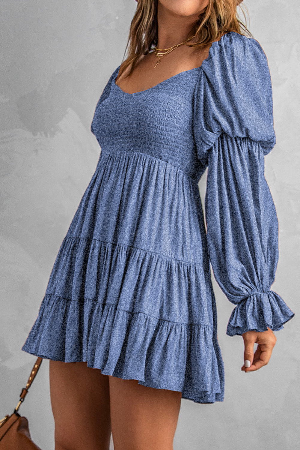 smocked off-shoulder tiered mini dress