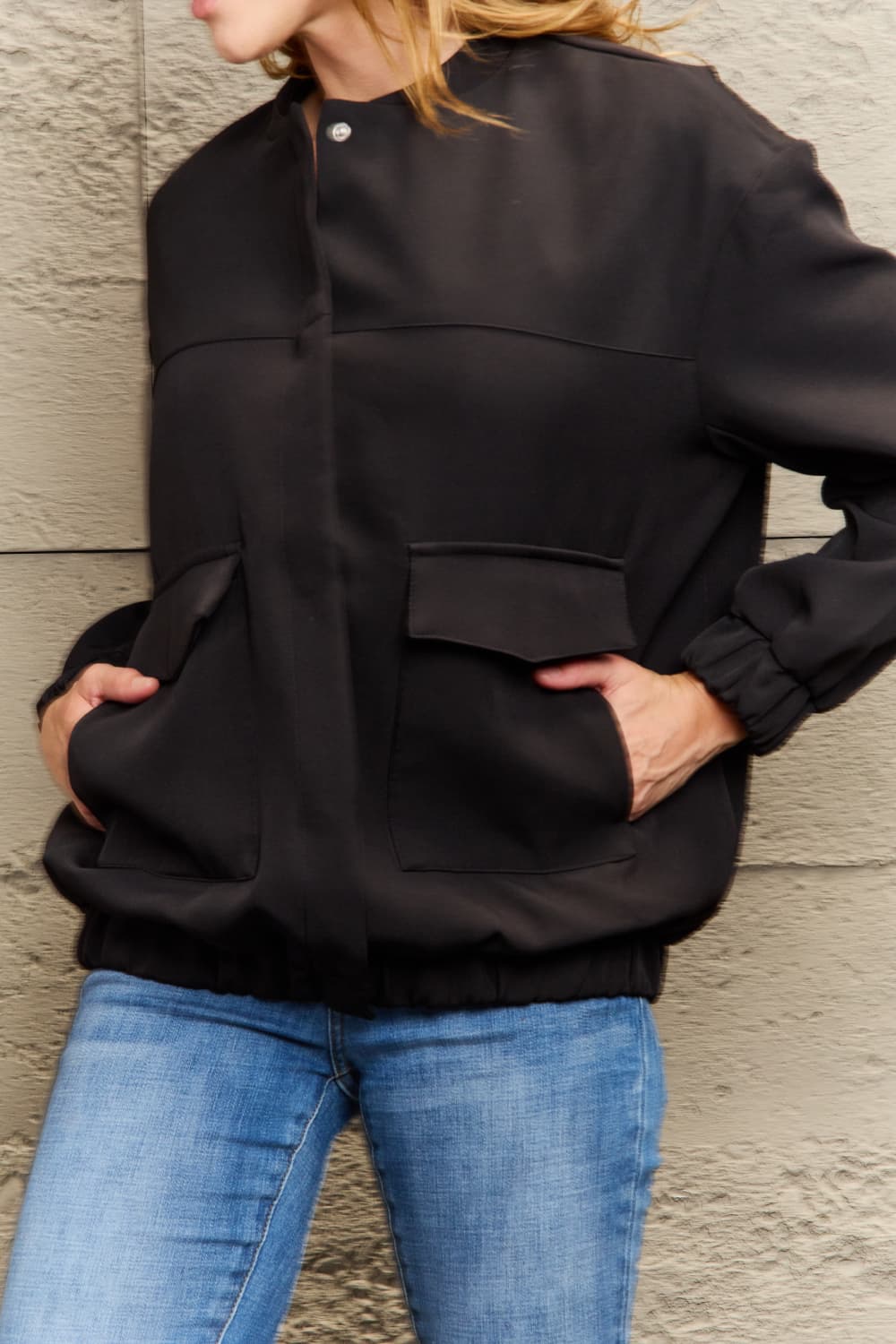 round neck dropped shoulder jacket with pockets