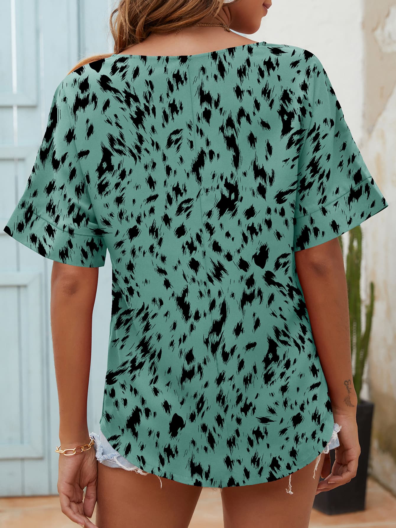 printed notched neck half sleeve blouse