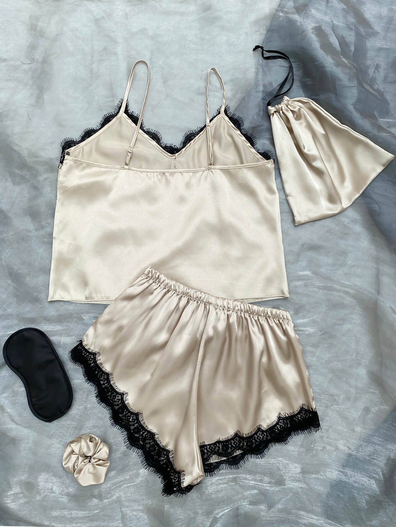 lace trim cami, shorts, eye mask, scrunchie, and bag pajama set