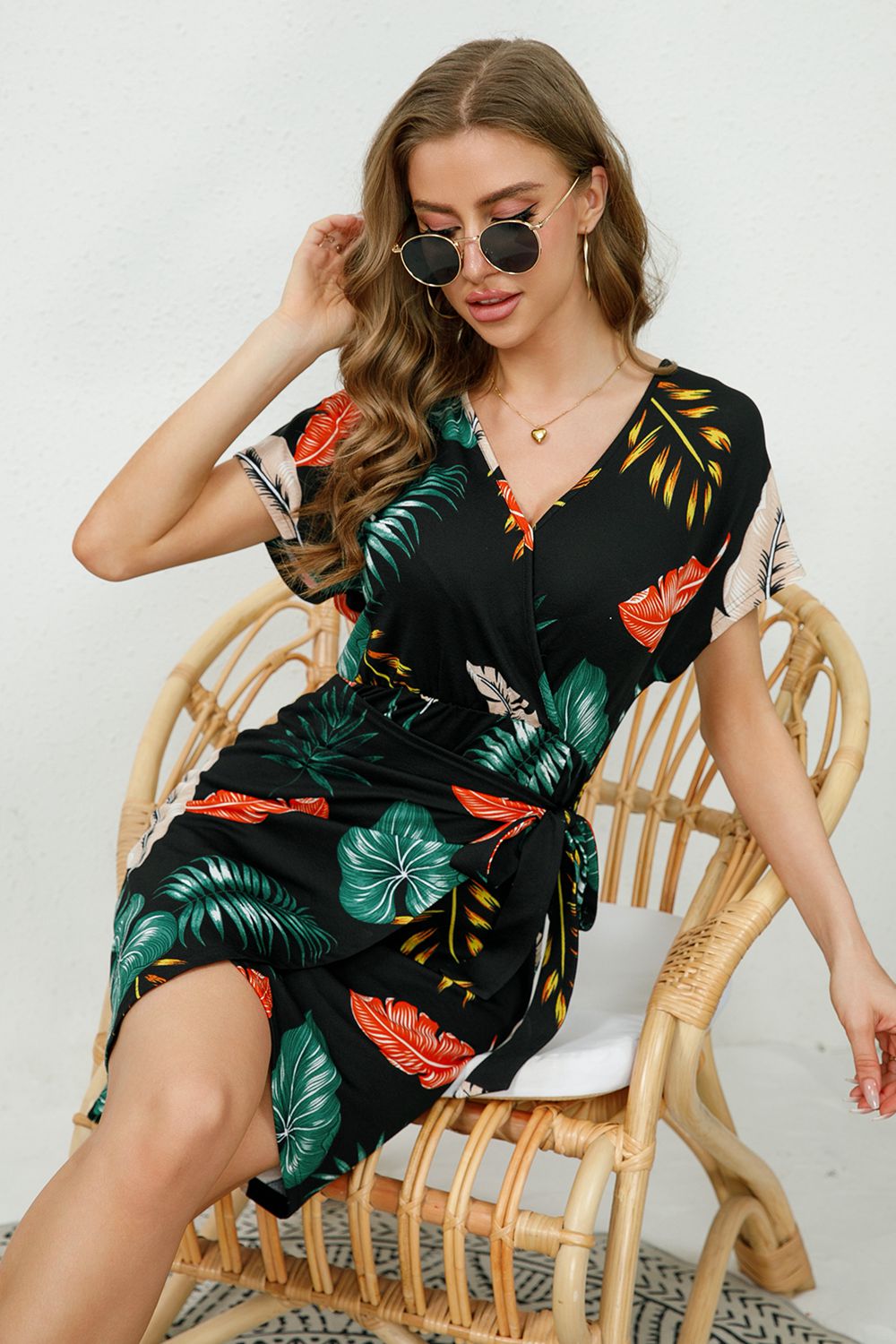printed surplice neck short sleeve side tie mini dress