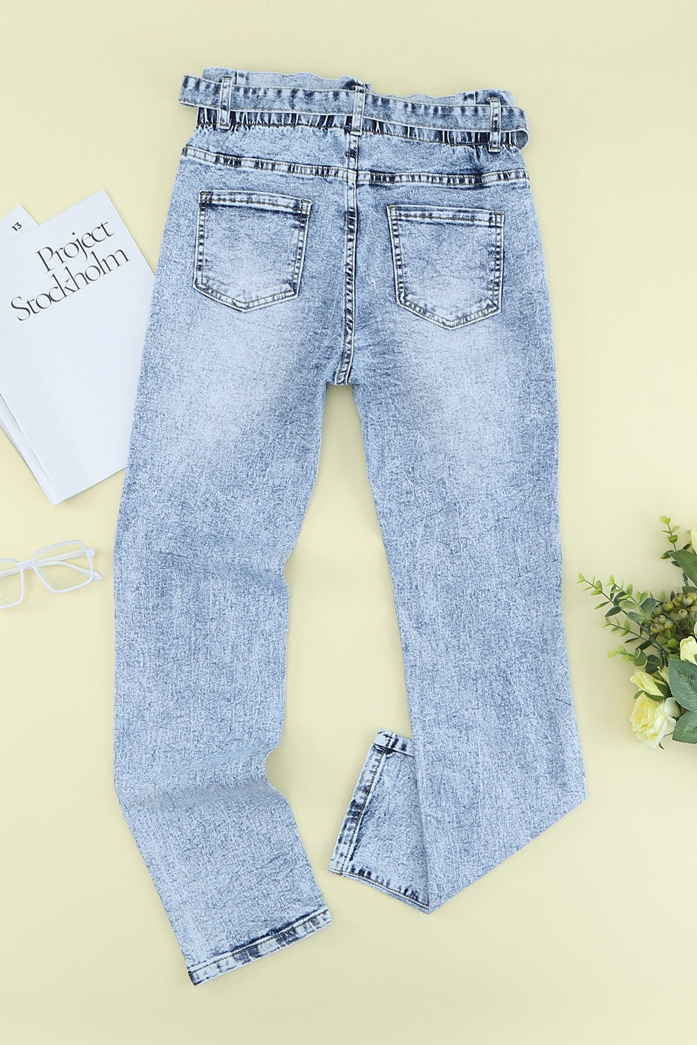 acid wash belted button fly distressed jeans