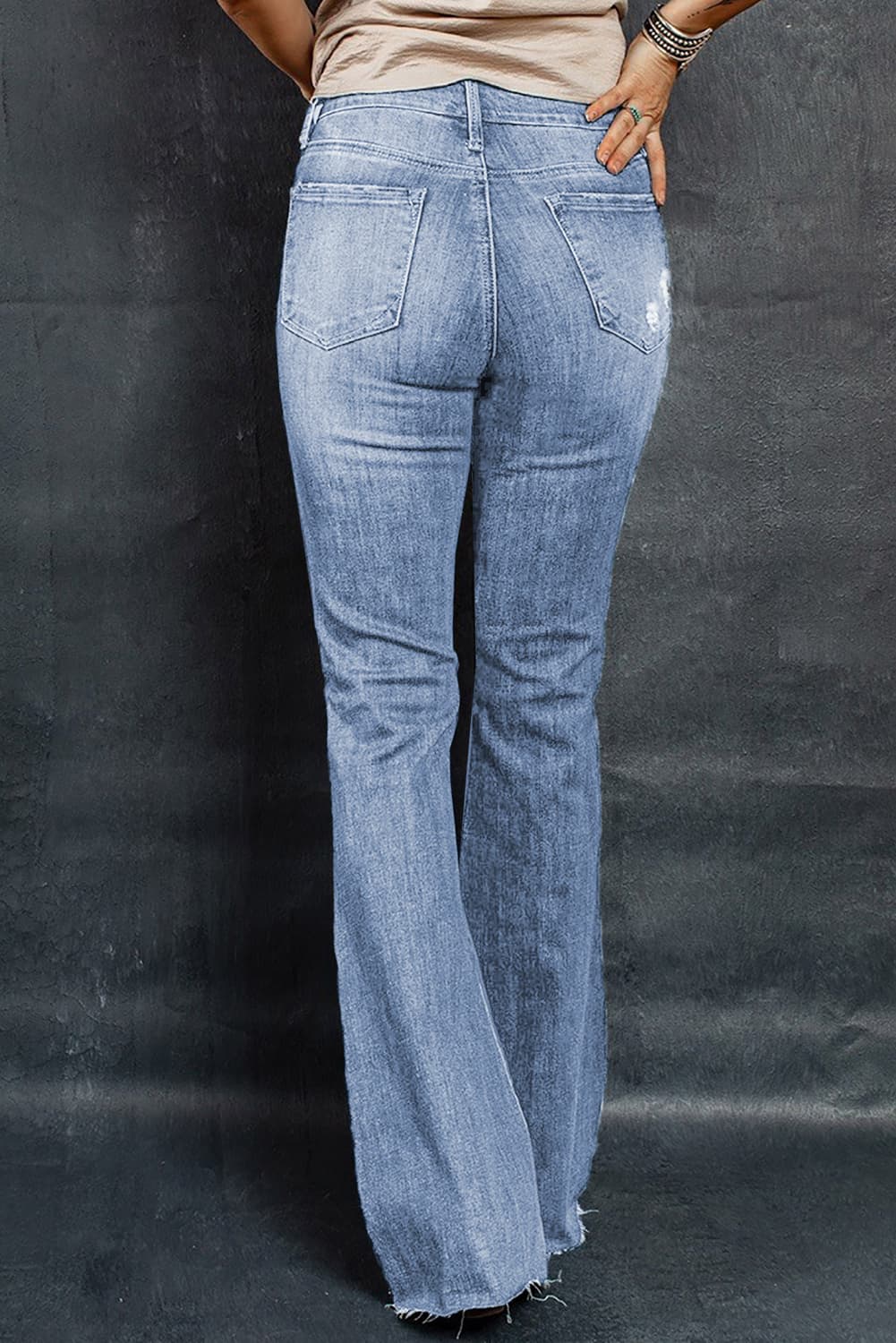 distressed raw hem flare jeans