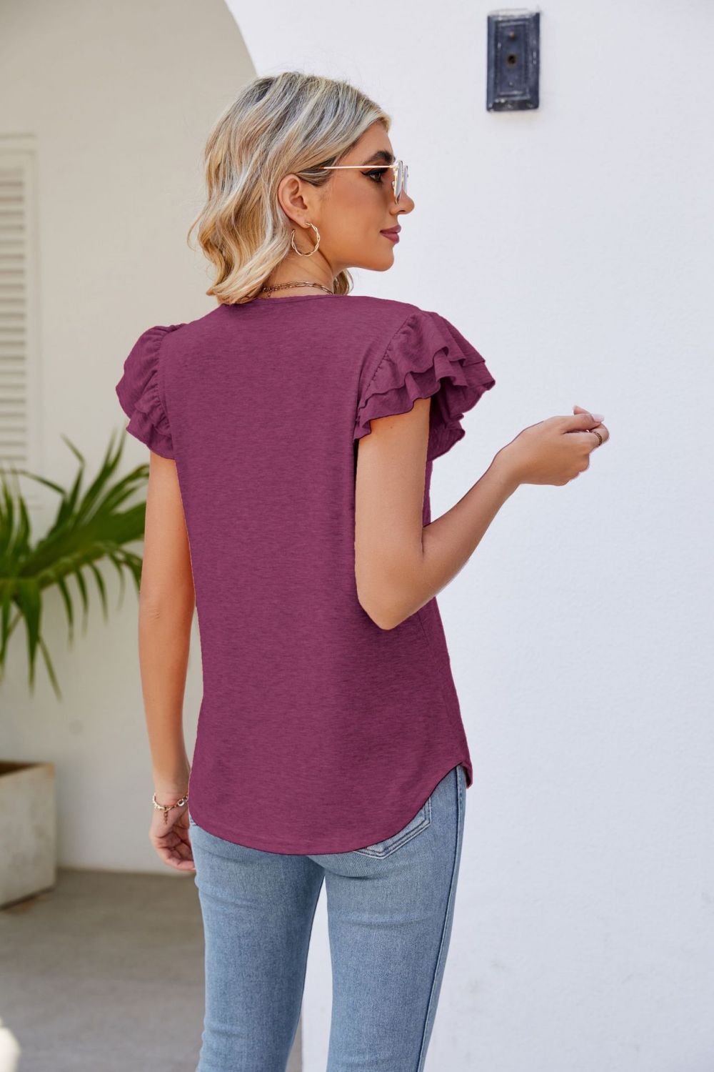 smocked flutter sleeve v-neck top