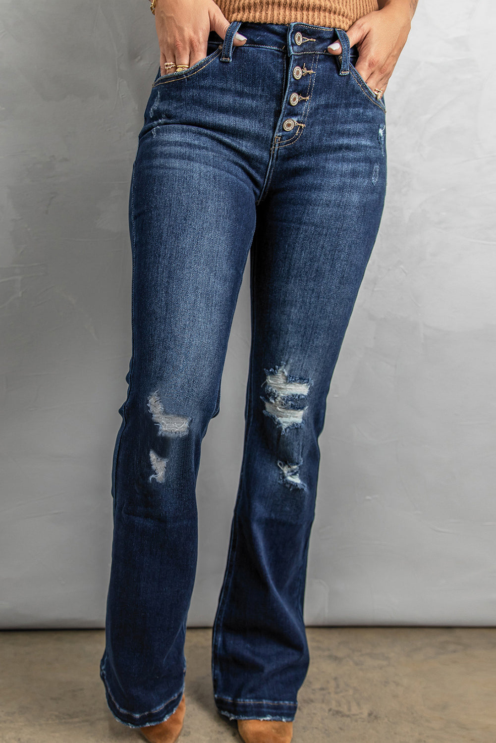 button fly distressed bootcut jeans