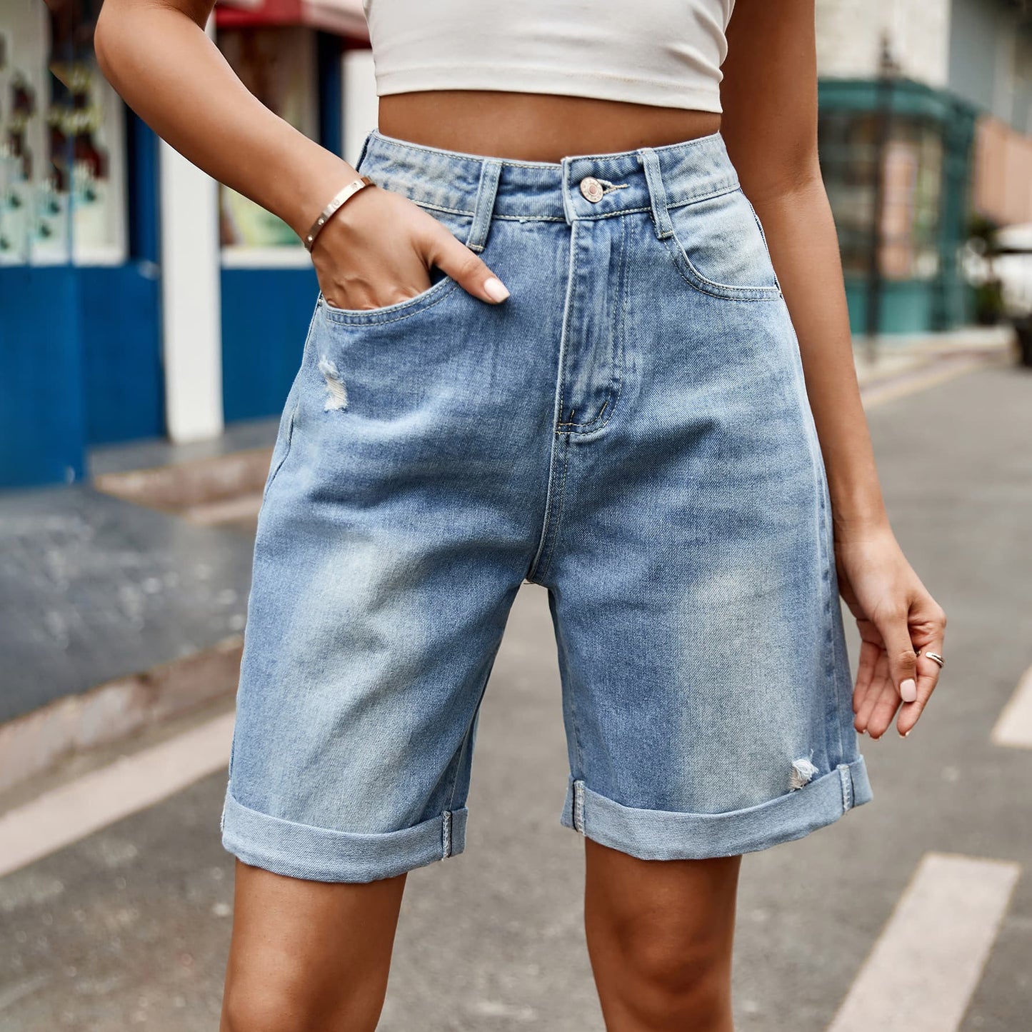 distressed buttoned denim shorts with pockets