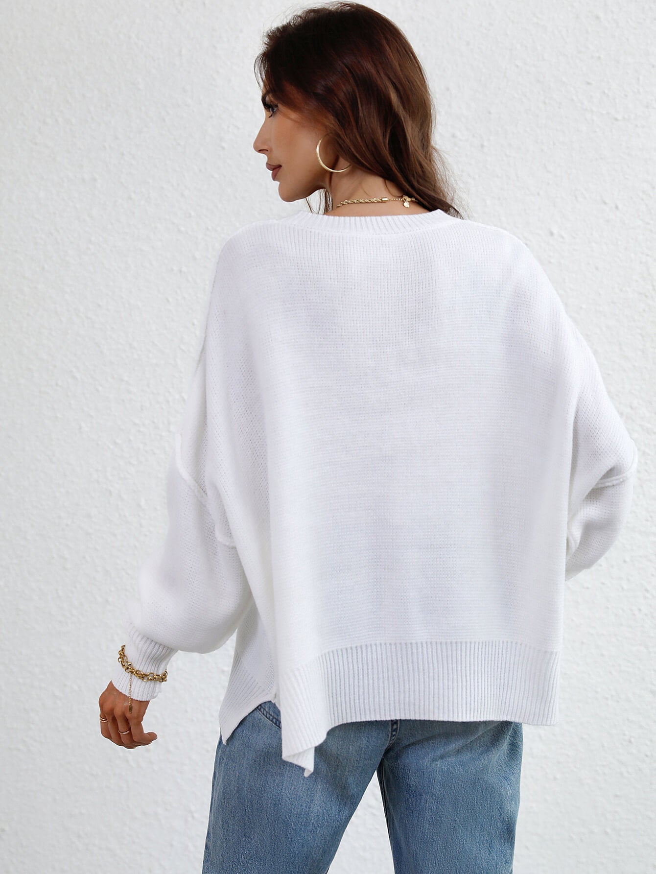 exposed seam dropped shoulder slit sweater