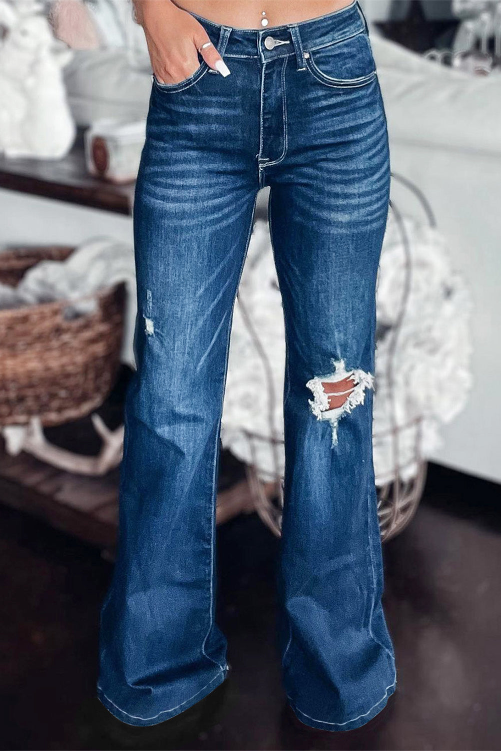 asymmetrical open knee distressed flare jeans