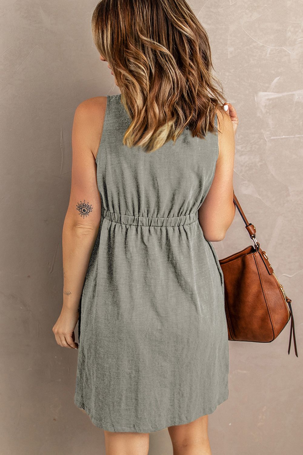 sleeveless button down mini magic dress