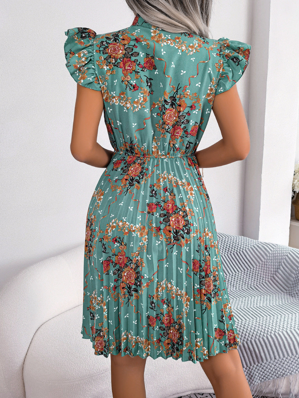 pleated floral printed tie neck knee length dress