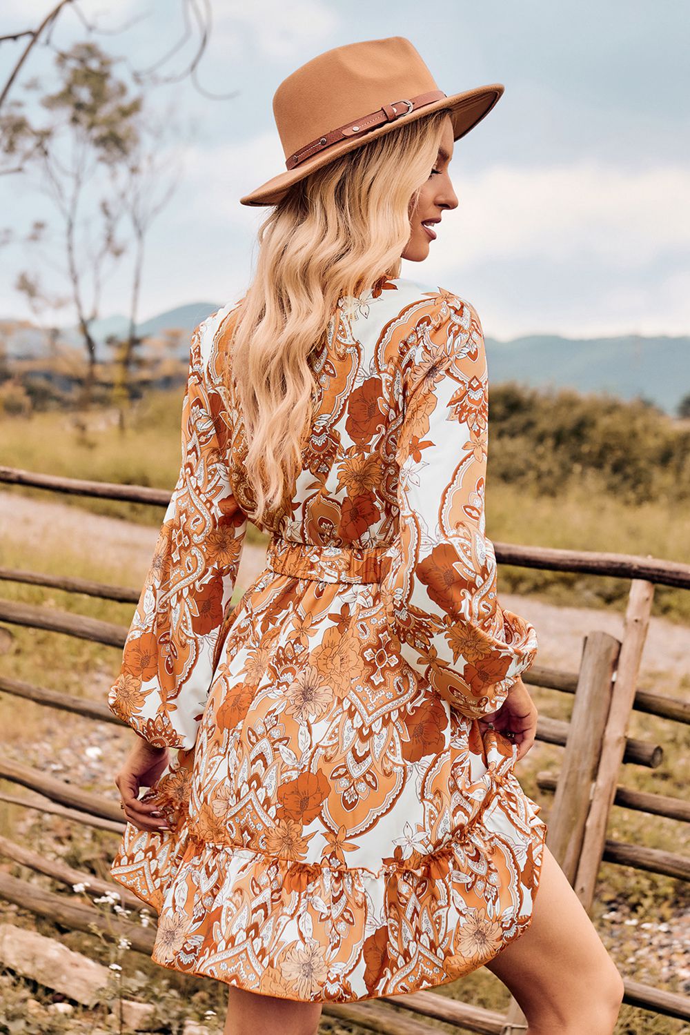 printed surplice neck long sleeve dress