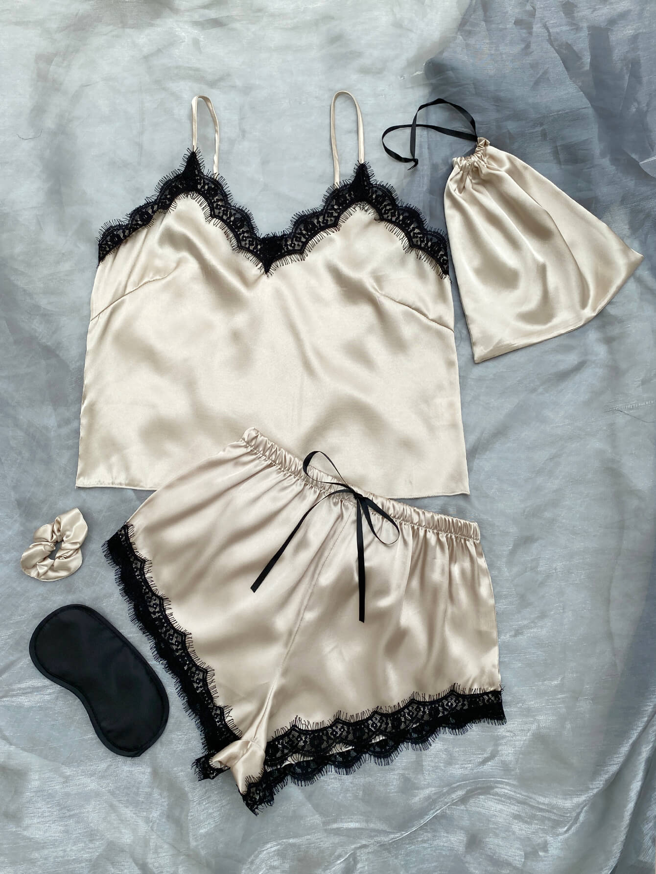 lace trim cami, shorts, eye mask, scrunchie, and bag pajama set