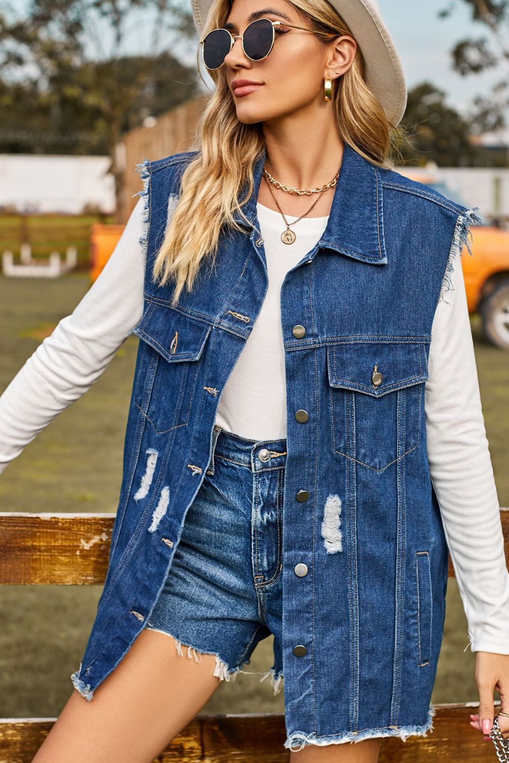 sleeveless button-up collared denim top with pockets