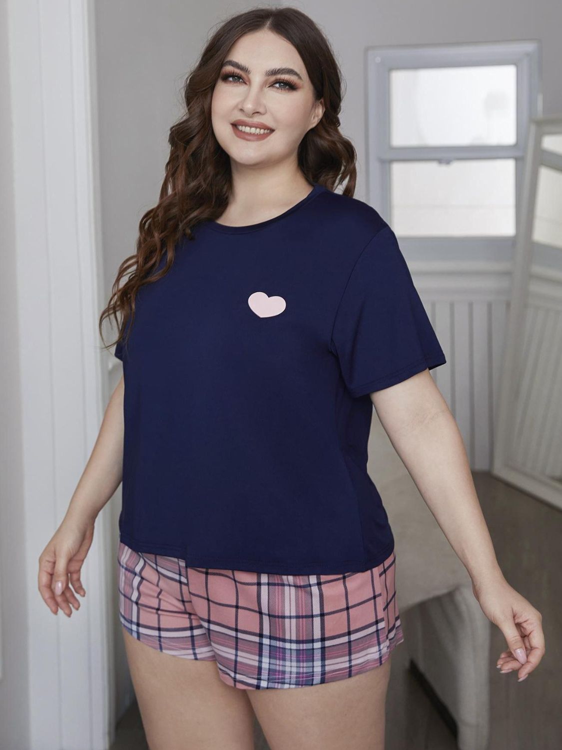 plus size heart graphic top and plaid shorts loungewear set