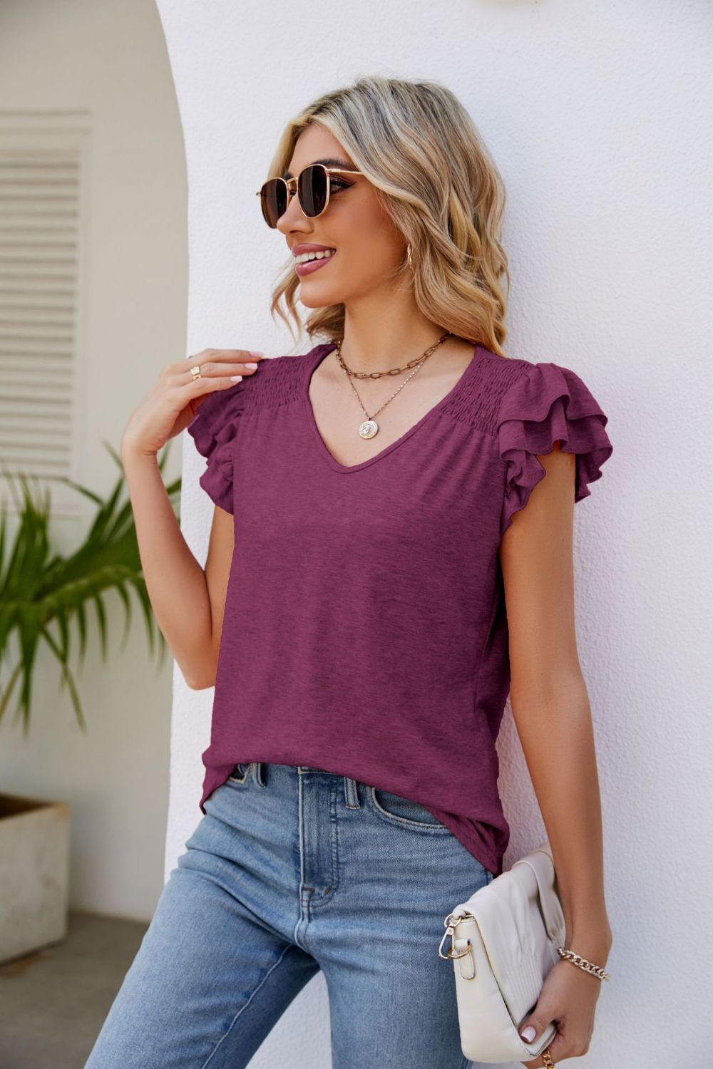 smocked flutter sleeve v-neck top