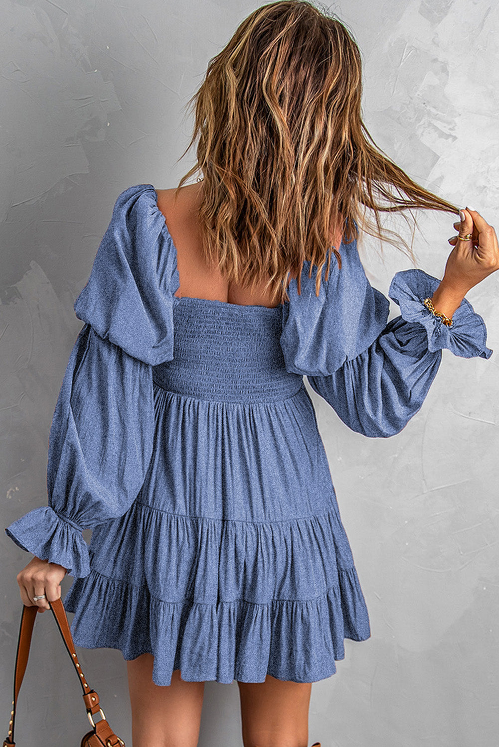 smocked off-shoulder tiered mini dress