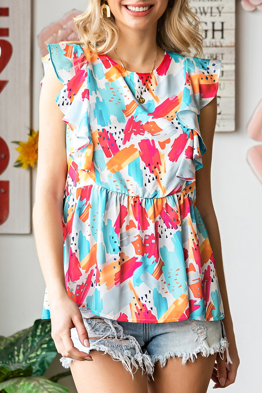 printed round neck ruffled peplum top