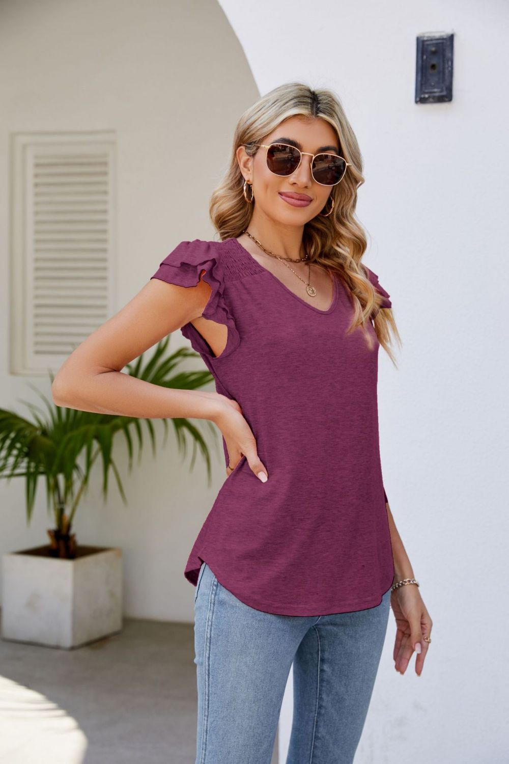 smocked flutter sleeve v-neck top
