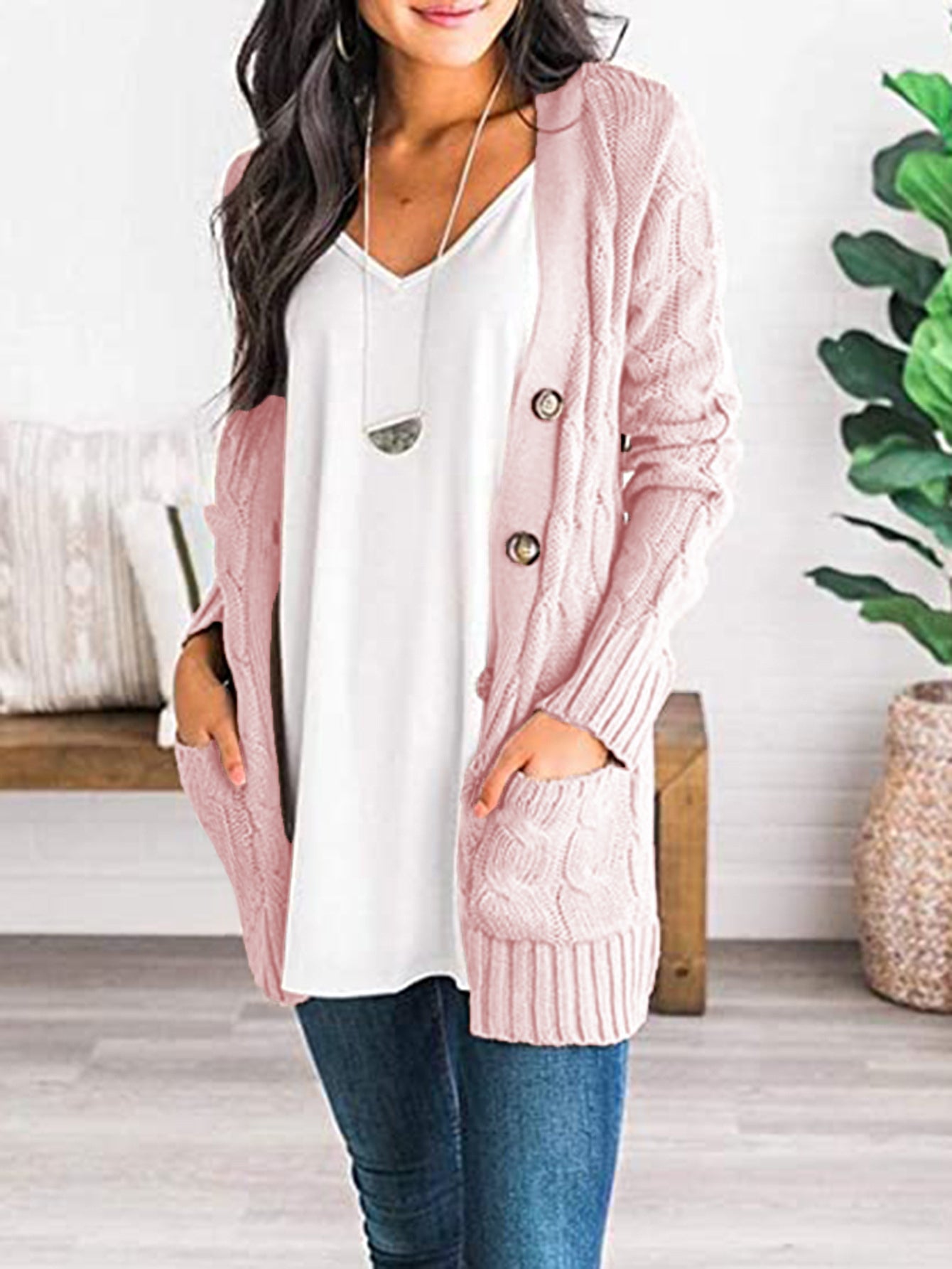 cable-knit buttoned cardigan with pockets