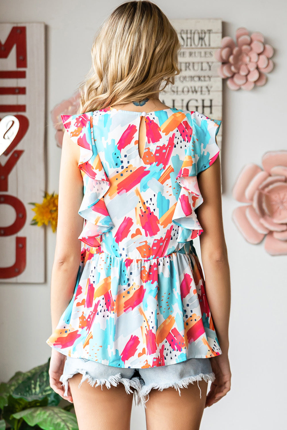 printed round neck ruffled peplum top