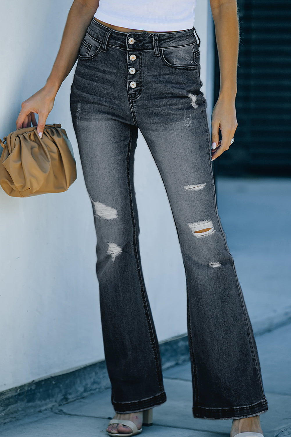 distressed button-fly flare jeans