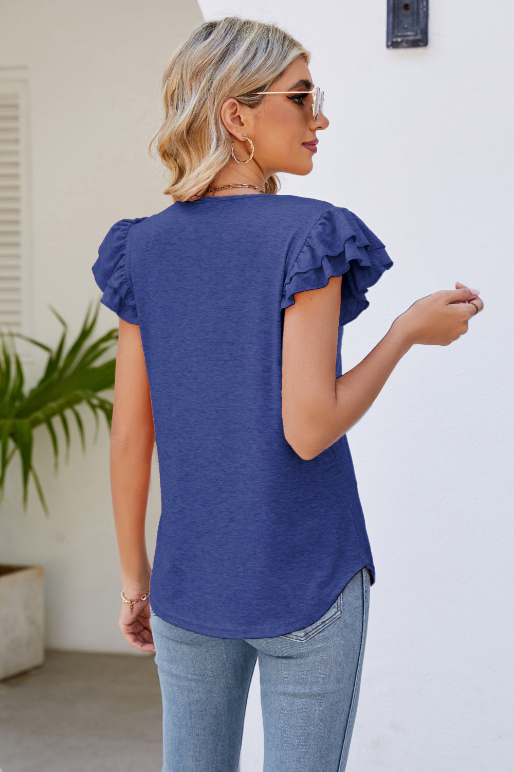 smocked flutter sleeve v-neck top