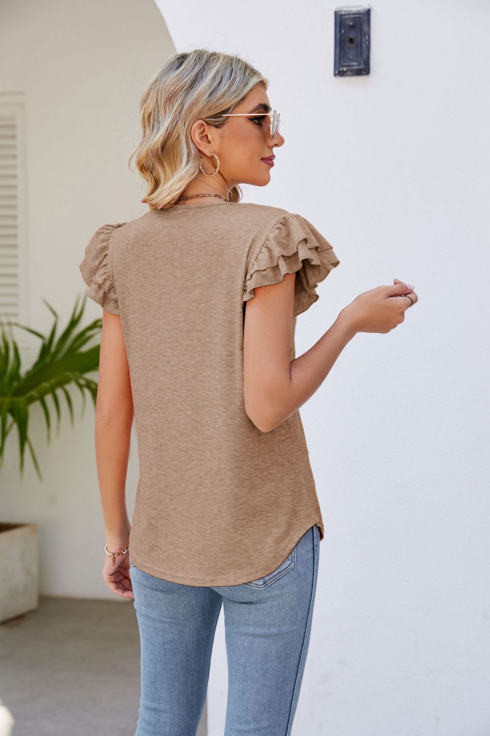 smocked flutter sleeve v-neck top